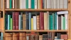 Part of a bookshelf containing books by ancient philosophers 1.1